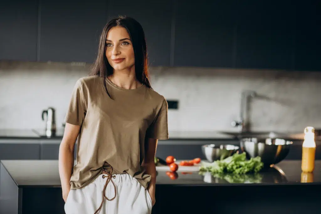Bianca in the kitchen preparing vegetables for a healthy Zepbound-friendly meal